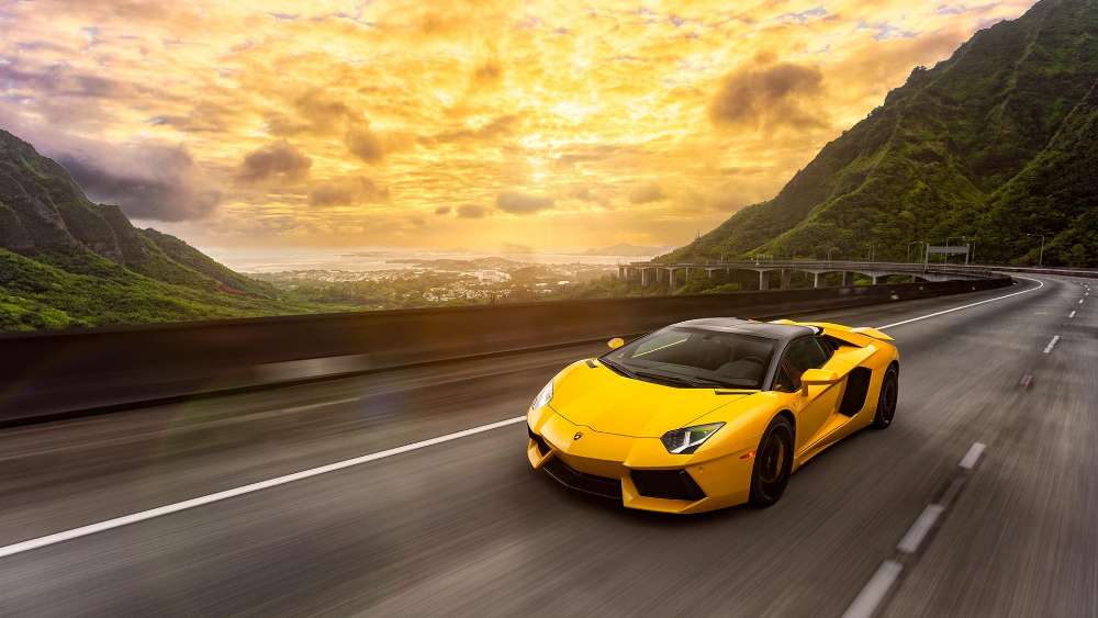 Blazing Sunset Ride in Yellow Lamborghini Aventador wallpaper