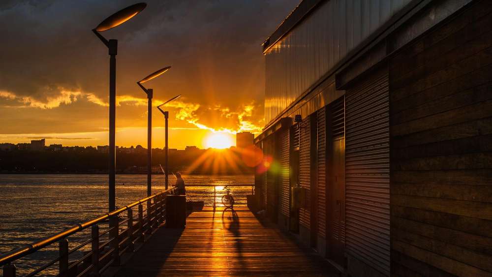 Sunset by the Waterfront Cityscape wallpaper