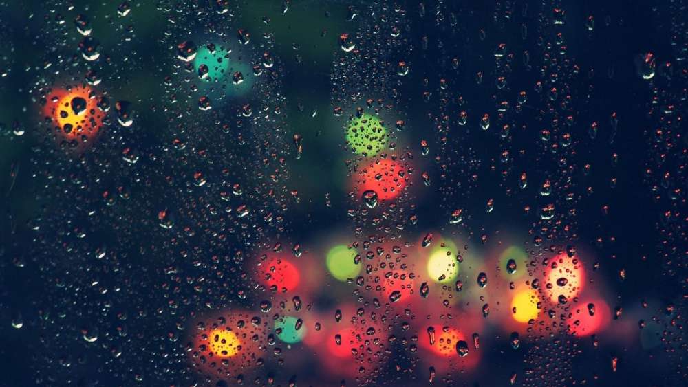 Raindrop Veil Over City Lights wallpaper