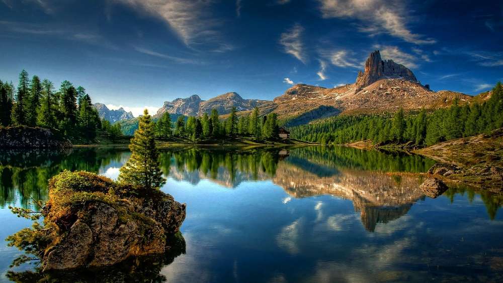 Tranquil Lake Embracing Sky's Mirror Image wallpaper