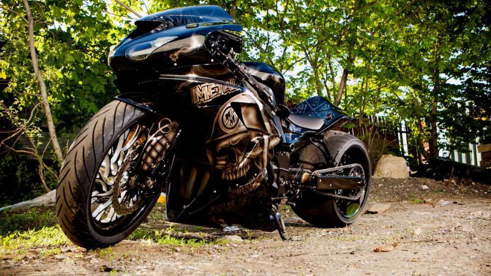 Sleek Motorcycle in Natural Surroundings wallpaper