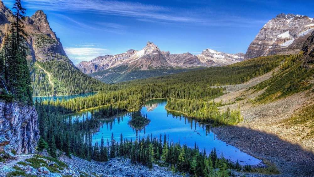 Mountain Serenity Reflected in Crystal Waters wallpaper