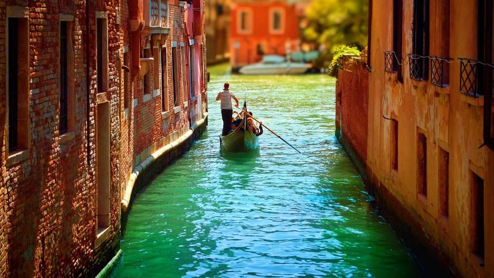 Romantic gondola floating on the canal wallpaper