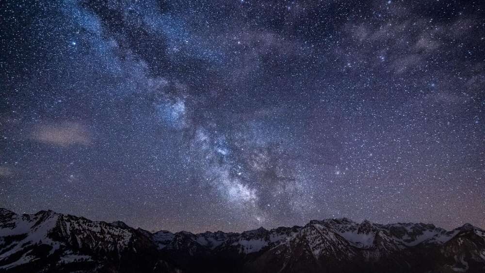Milky way over the mountains wallpaper