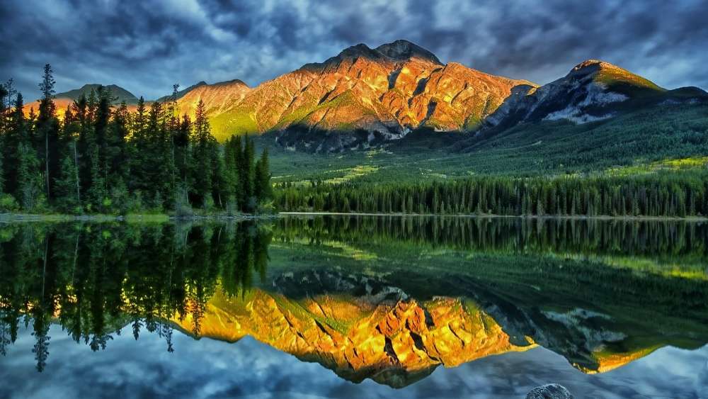 Sunlit Peaks Over Serene Lake wallpaper