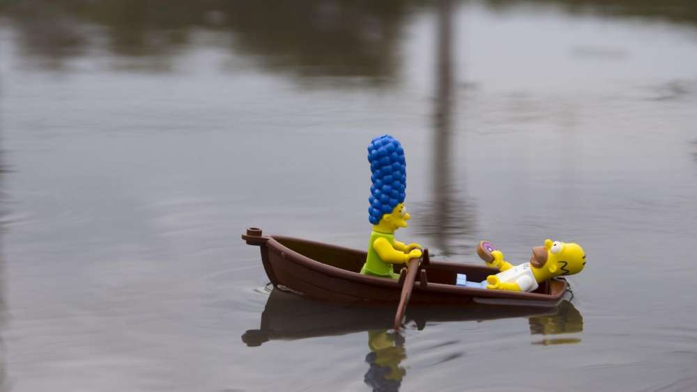 Marge and Homer's Relaxing Boat Adventure wallpaper
