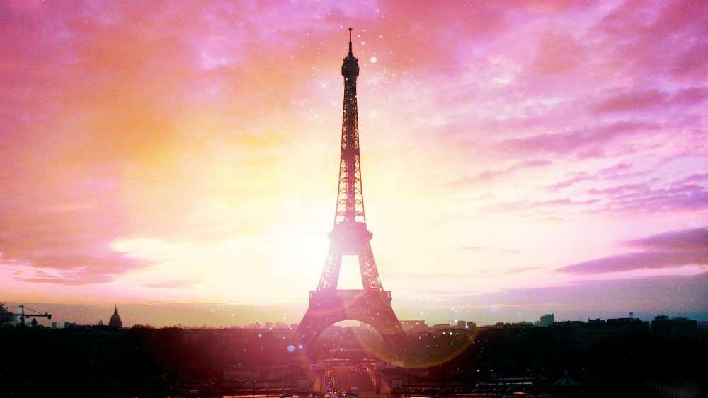 Eiffel Tower Under a Starlit Sunset Sky wallpaper