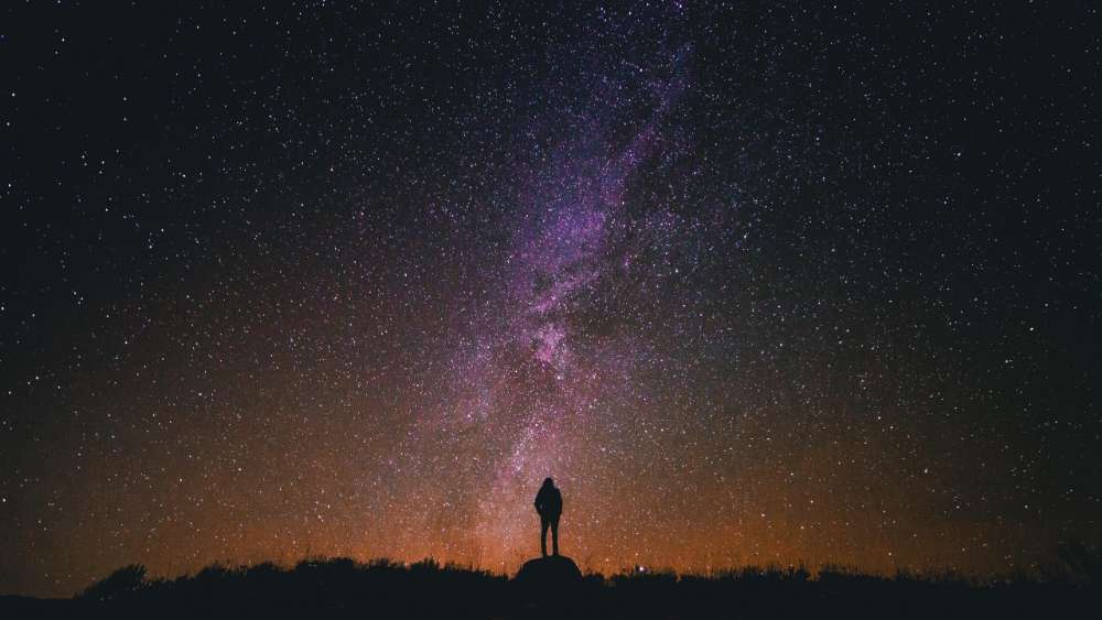 Stargazer's Solitude Under the Milky Way wallpaper