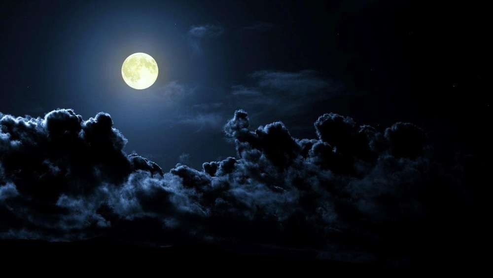Mystical Moonlight Through Whispering Clouds wallpaper