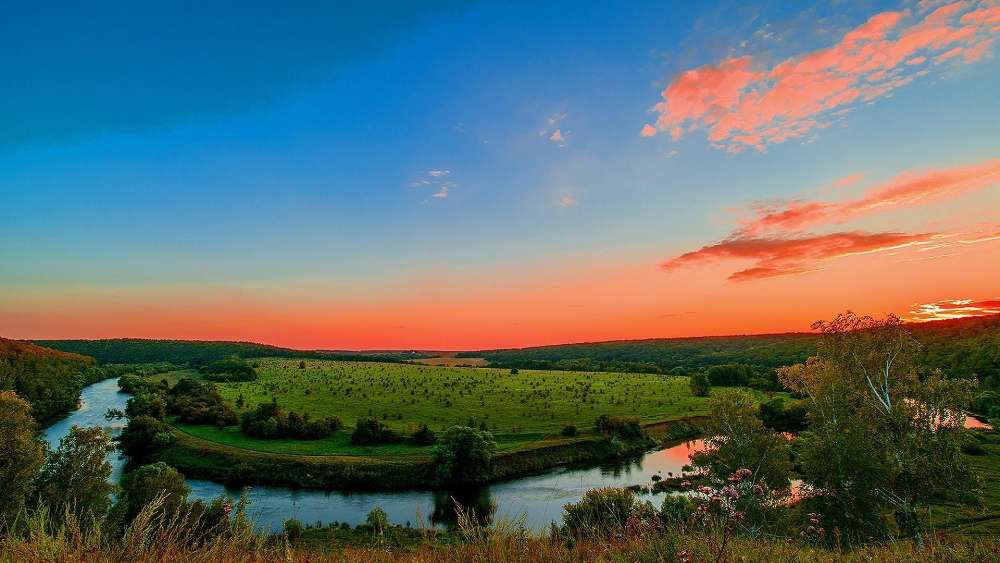 Sunset Serenade Over Tranquil Landscape wallpaper