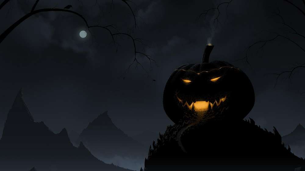 Glowing Pumpkin Against Spooky Night Backdrop wallpaper