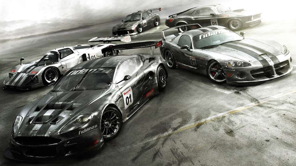 Powerful Racing Machines on the Track wallpaper