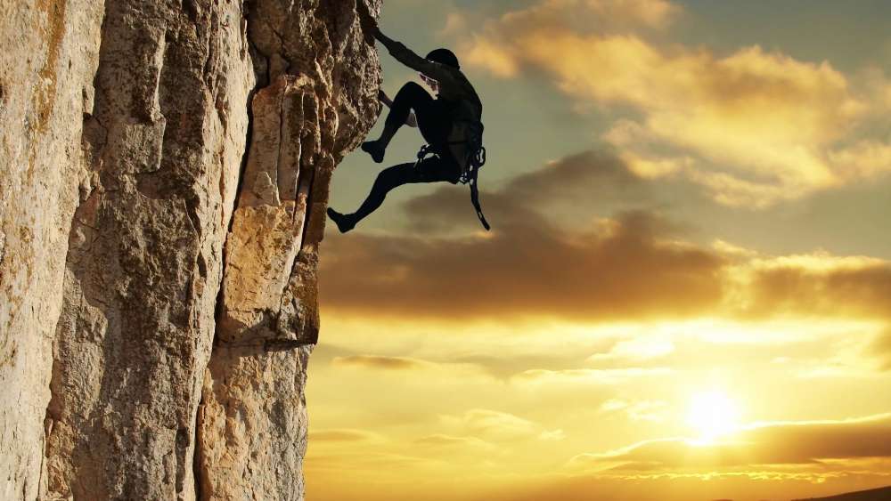 Climber Against the Sunset wallpaper