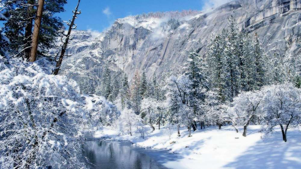 Winter Serenity in a Snowy Mountain Landscape wallpaper