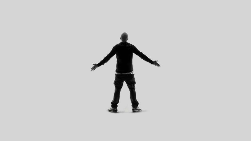 Eminem Stands Tall in Stark Silhouette wallpaper