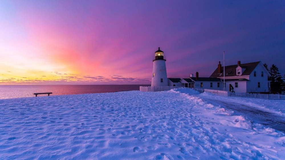 Winter Solace at the Shoreline Lighthouse wallpaper