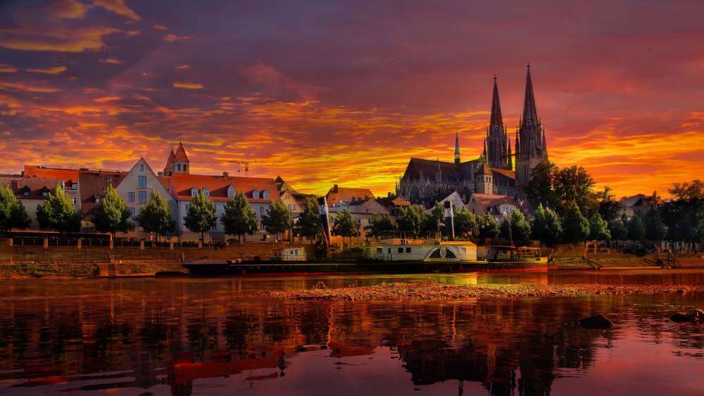 Sunset Over Gothic Spires and River Reflections wallpaper