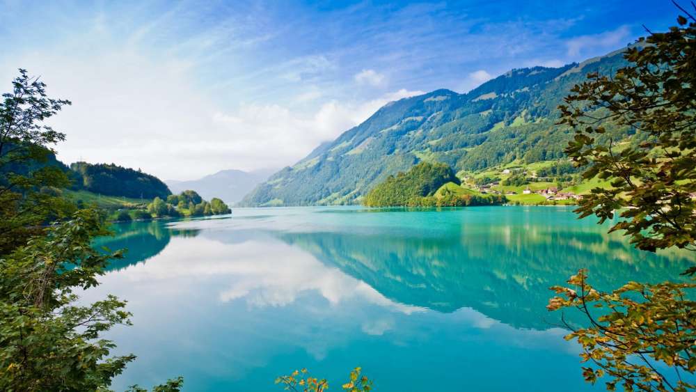 Serene Reflection Over Tranquil Lake wallpaper