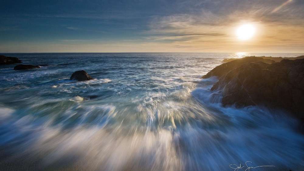 Serene Ocean Sunset with Gentle Waves wallpaper