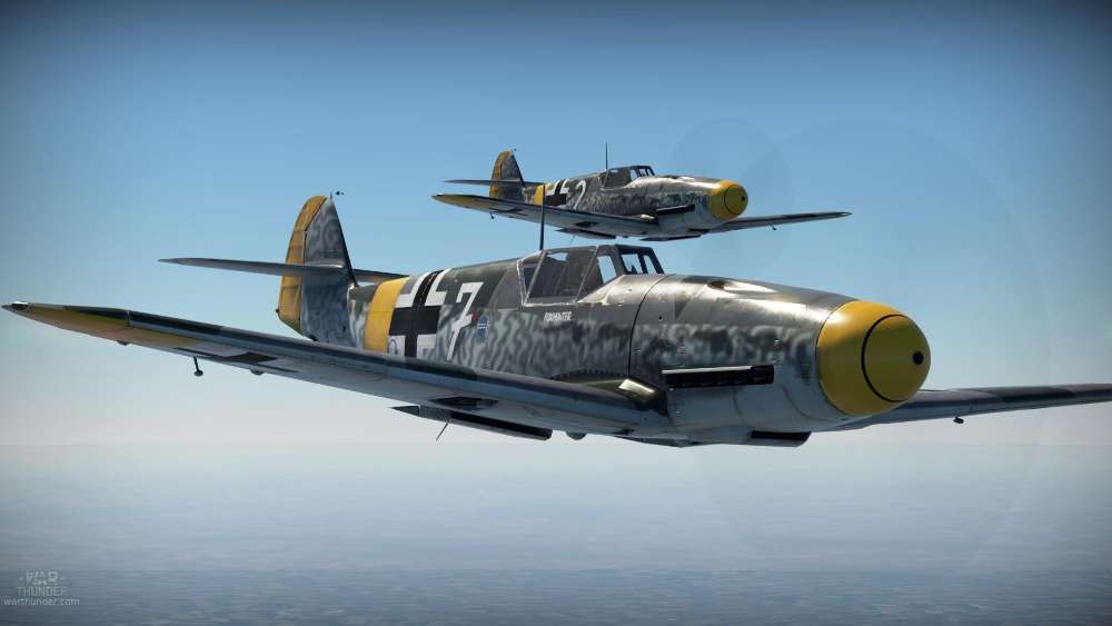 WW2 Bf-109 Fighters Soaring Through Blue Skies wallpaper