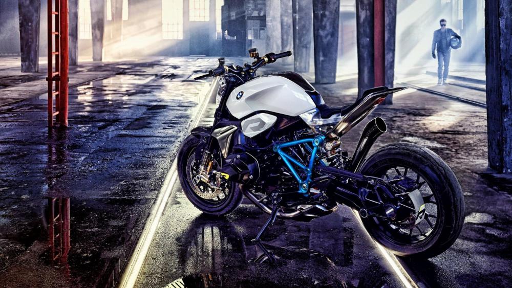 BMW Motorcycle Awaits Adventure on Rainy Street wallpaper