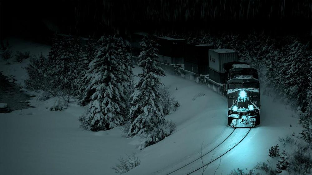 Midnight Train through Snowy Pines wallpaper