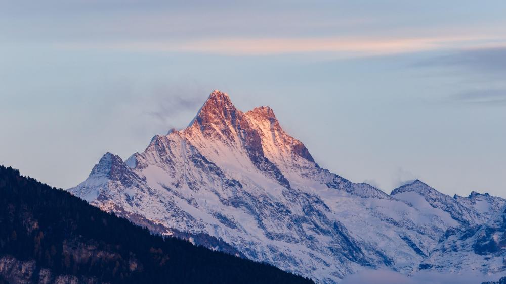 Majestic Mountain Peaks in Glorious Dawn Light wallpaper