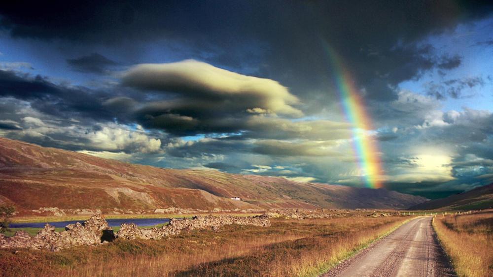 Endless road with rainbow wallpaper