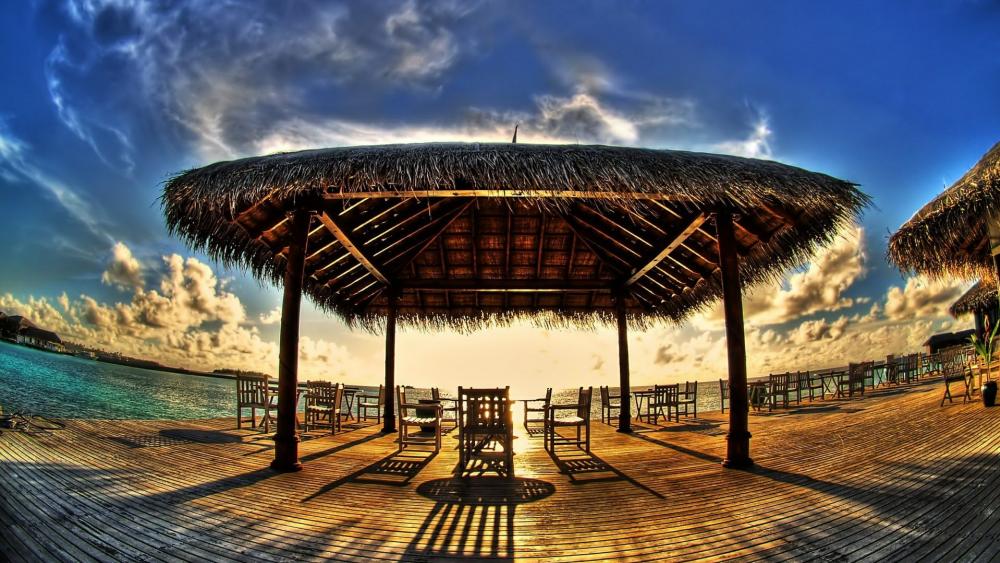 Huge parasol on a pier in the morning wallpaper