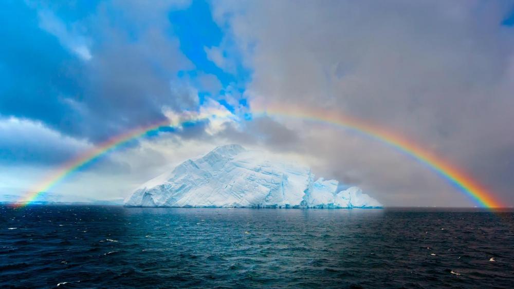 Rainbow over the iceberg wallpaper