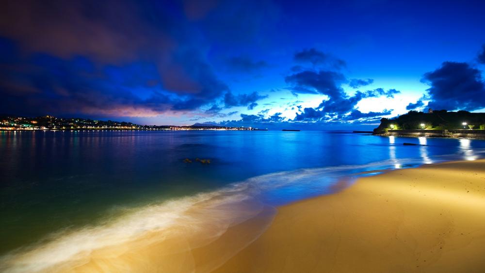 Night sky over the beach wallpaper