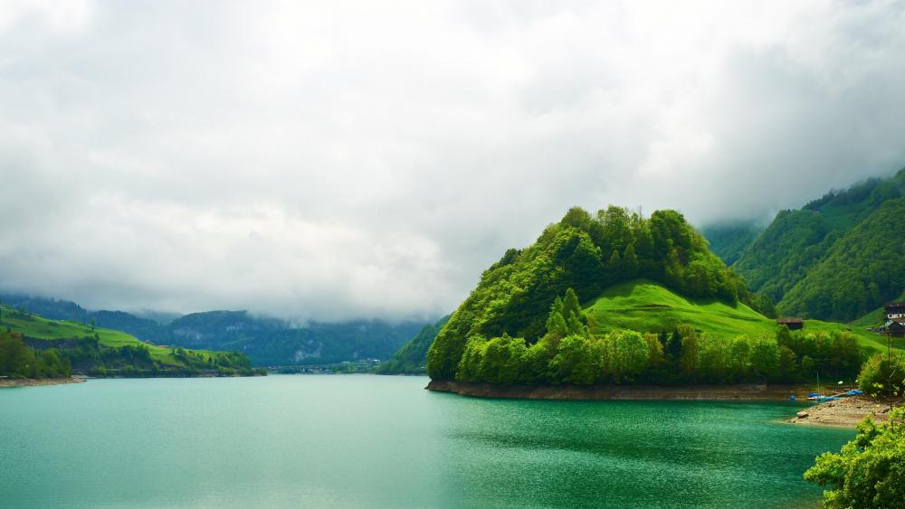 Emerald Mountain Lake in Lungern, Switzerland wallpaper