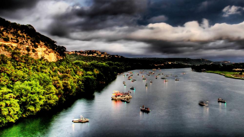 River boats under the cludy sky wallpaper