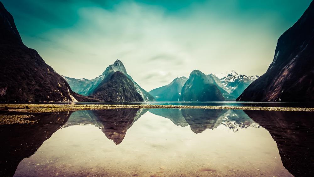 Milford Sound reflection in the morning sunlight, Fiordland National Park, New Zealand wallpaper