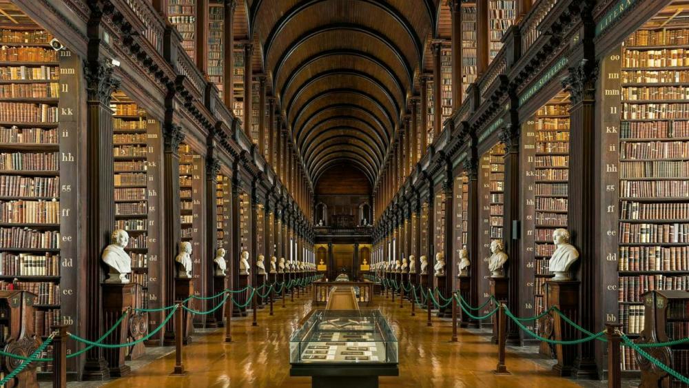 Majestic Aisles of Knowledge at Trinity College Library wallpaper