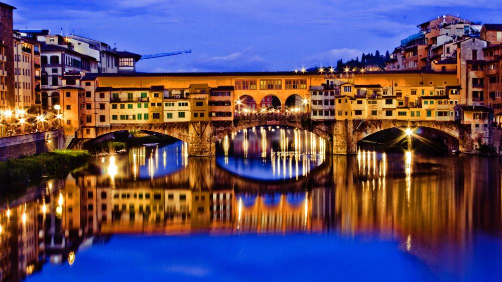 Ponte Vecchio Bridge and the Arno River at dusk wallpaper