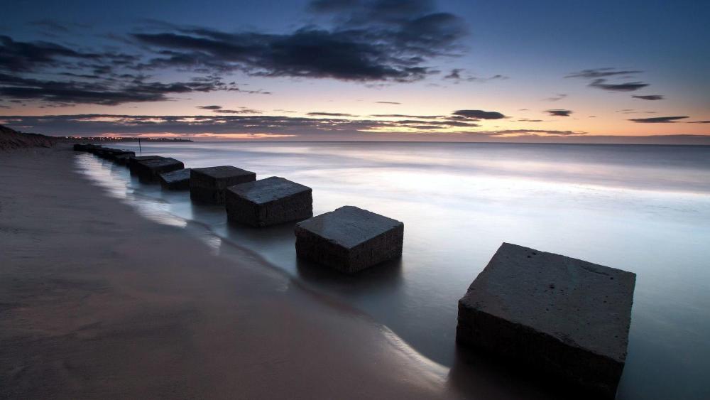 Stone cubes in the shore wallpaper