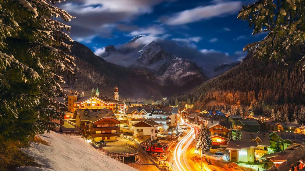 Canazei ski resort on a winter evening - Italy wallpaper