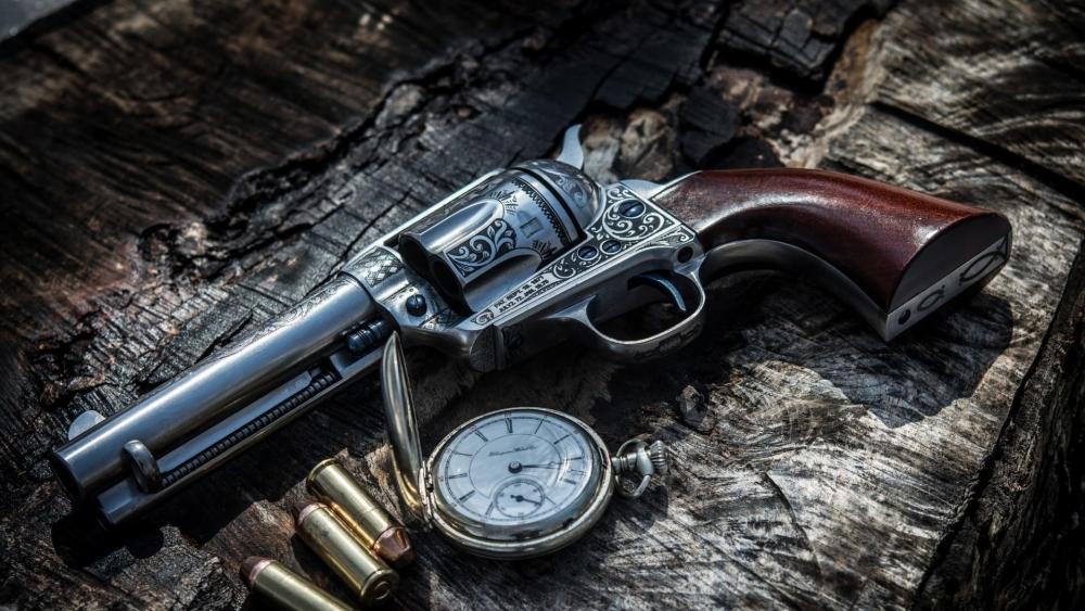 Pocket watch and an antique revolver wallpaper