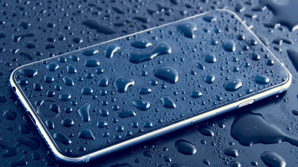 Waterdrops on a cell phone wallpaper