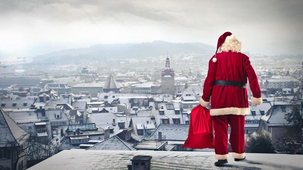 Santa Claus on the roof wallpaper