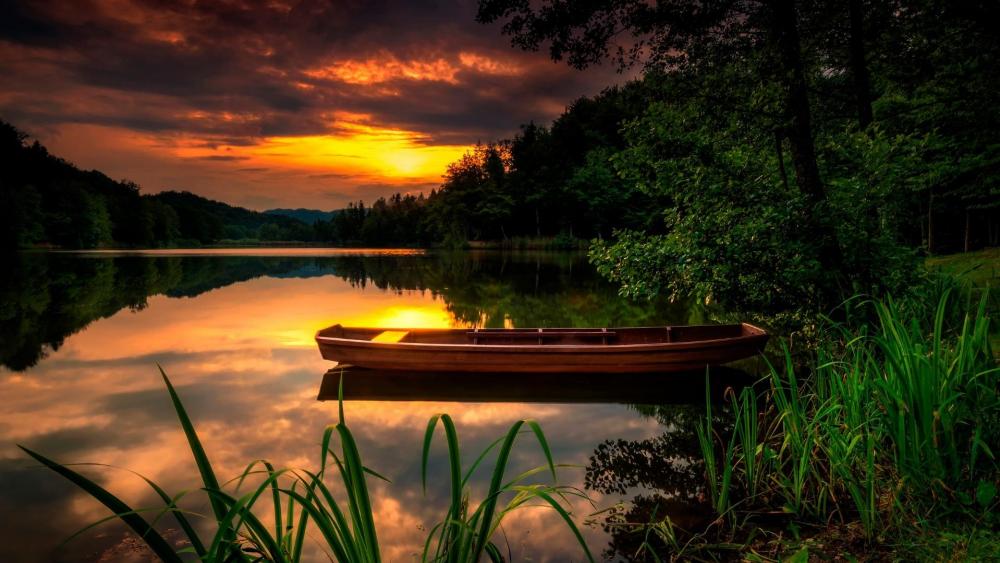 Boat in the sunset wallpaper