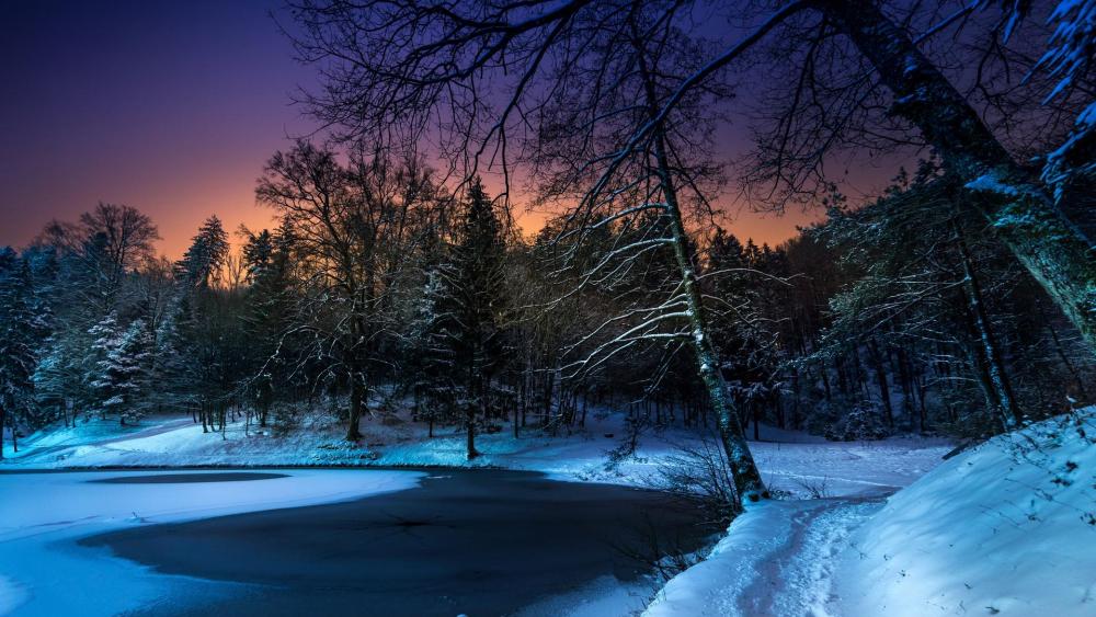 Frozen lake at night wallpaper