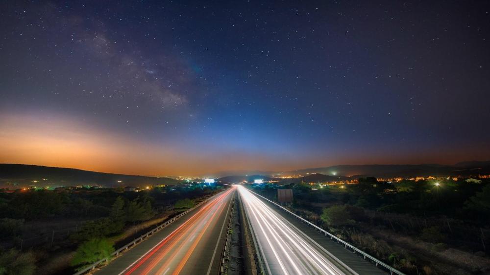 Milky way over the highway wallpaper