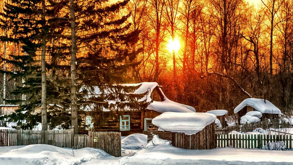 Snowy log cabin wallpaper