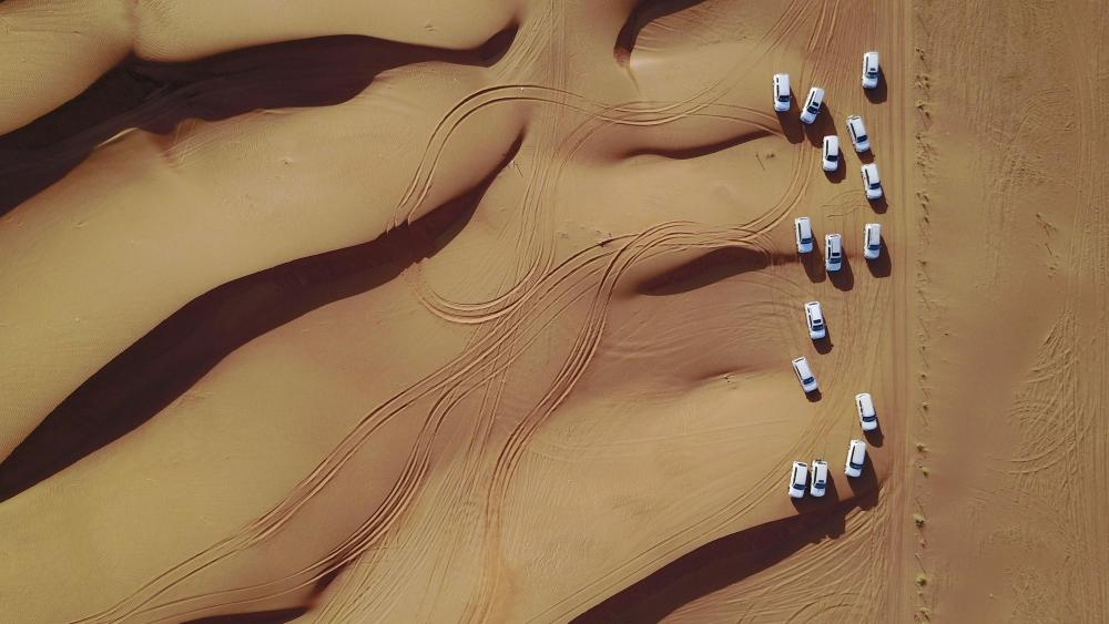 Car team in desert wallpaper