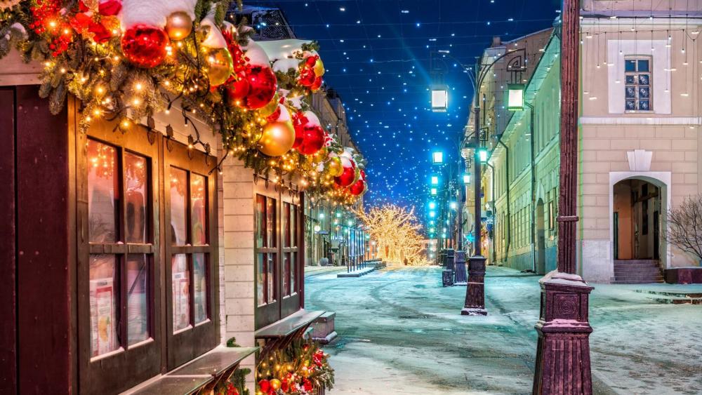 Snowy street at Chrismas in Moscow wallpaper