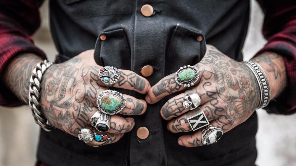 Tattooed hands wallpaper