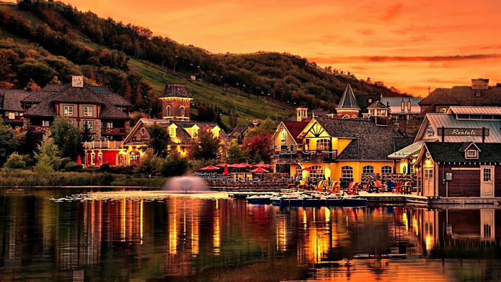 Lakeside village at sunset wallpaper