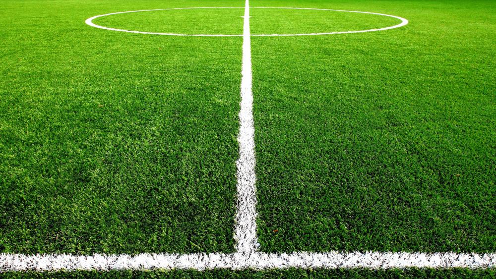 Artificial grass with white lines for football field wallpaper